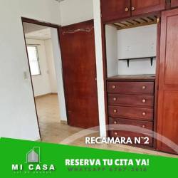 Bedroom with wooden closet, white walls and tiled floor in Penonomé Coclé rental house