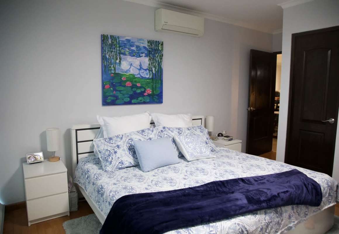 Laundry area with washer, dryer, utility sink, and storage cabinets PH Pacific Sun