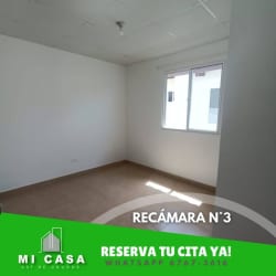 Compact kitchen with brown cabinets ceramic flooring Penonomé house rental Panama