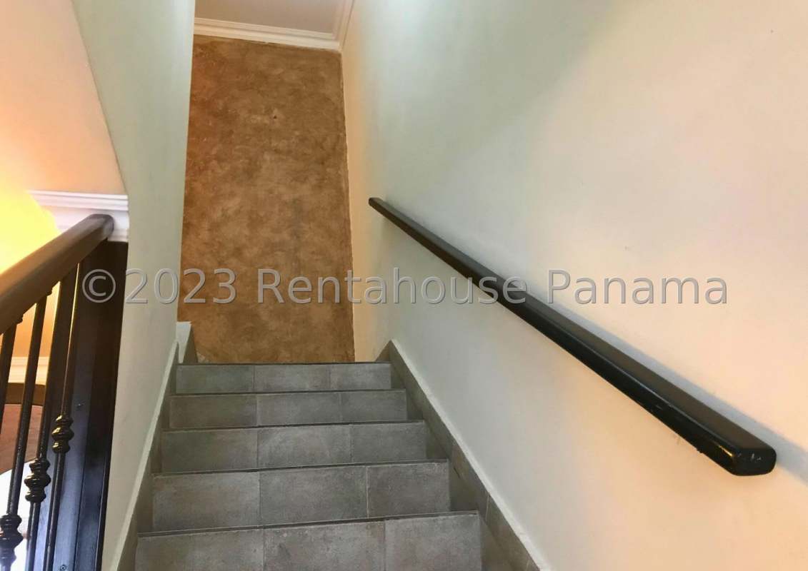 Ceramic-tiled kitchen with colonial cabinetry, bright counters in Panama City