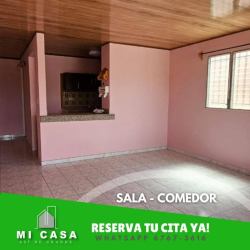 Spacious living dining with pink walls, wood ceiling and tiled floors Villa Bonita Penonomé