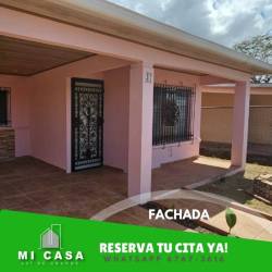 View of backyard garden fenced from laundry patio Villa Bonita Penonomé