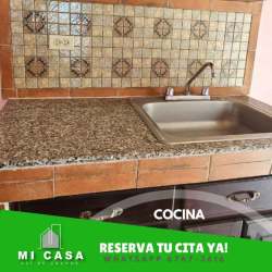 Tiled kitchen with granite counter and cabinet drawers in Villa Bonita Penonomé