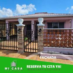 Covered porch with decorative iron gate entrance to house Villa Bonita Penonomé