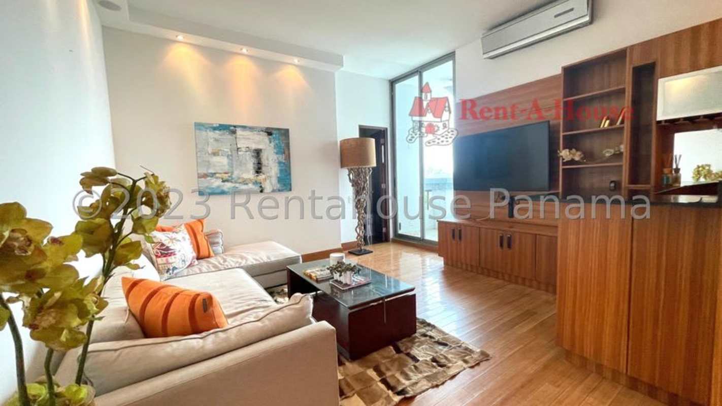 Spacious dining room with large windows overlooking Panama Canal luxury Amador apartment