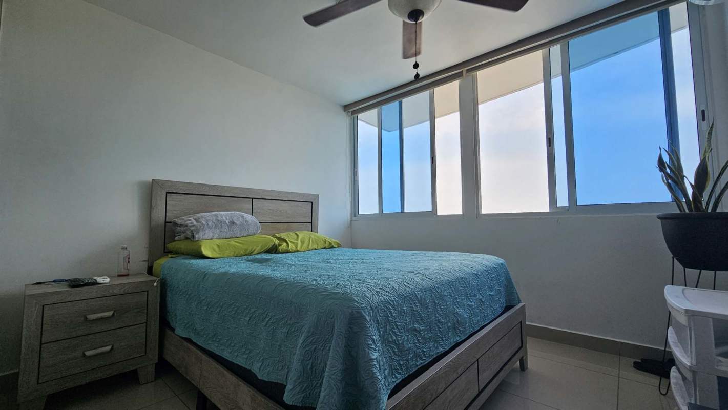 Modern bathroom with glass shower and tile walls PH Villa de las Fuentes Panama City