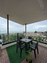 Spacious master bedroom with floor to ceiling windows ocean view in PH Mareas Beach Club penthouse Panama
