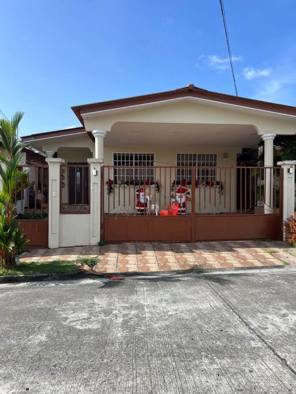 Gated entrance and covered porch at furnished rental house in Brisas del Golf Panama City