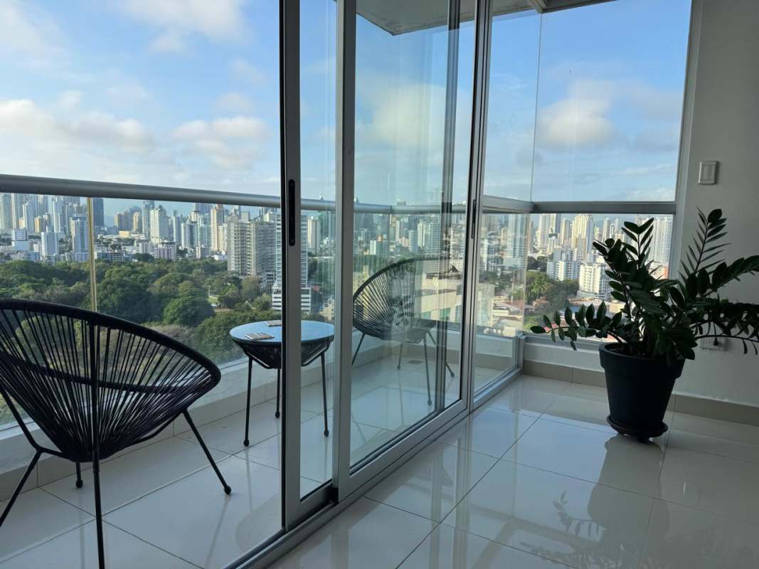 Living room with skyline view balcony Carrasquilla Panama City