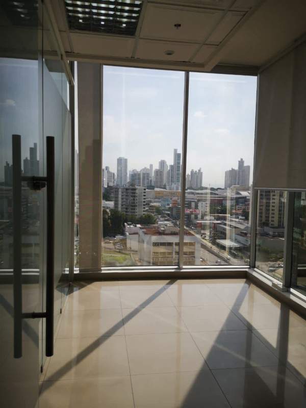 Empty commercial office with floor-to-ceiling windows panoramic city views PH BICSA Obarrio Panama
