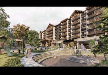 White cabinetry wood floor modern kitchen dining open plan Boquete Panama condo