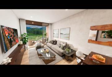 Modern living room with balcony large glass doors mountain scenery Boquete Panama