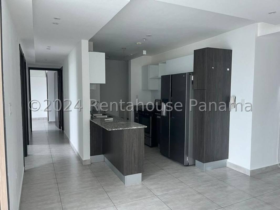 Modern kitchen with granite tops, stainless steel appliances in PH Condado Gardens Panama