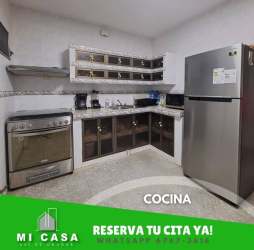 Modern kitchen with granite countertop fridge microwave stove rental house Penonomé Coclé