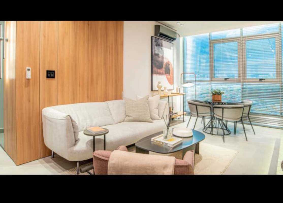 Bedroom with large window city skyline views, built-in closet PH Bloom San Francisco Panama