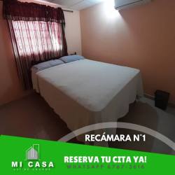 Living and dining area with sofas, dining furniture in Villa Karola Penonomé Panama rental house