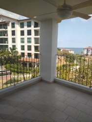 Bright living area with sectional sofa, dining, balcony ocean view, PH Los Galeones San Carlos Panama
