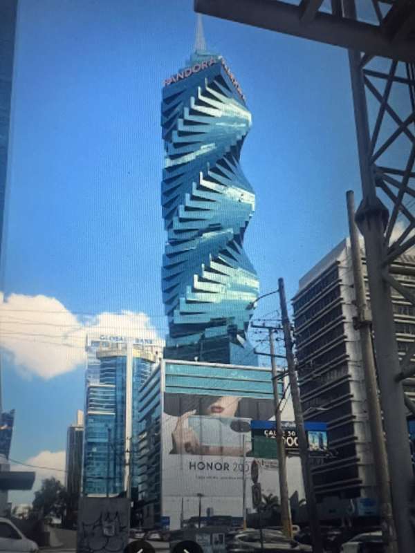 Spacious office rental interior with glass partitions and skyline views in F&F Tower Panama City