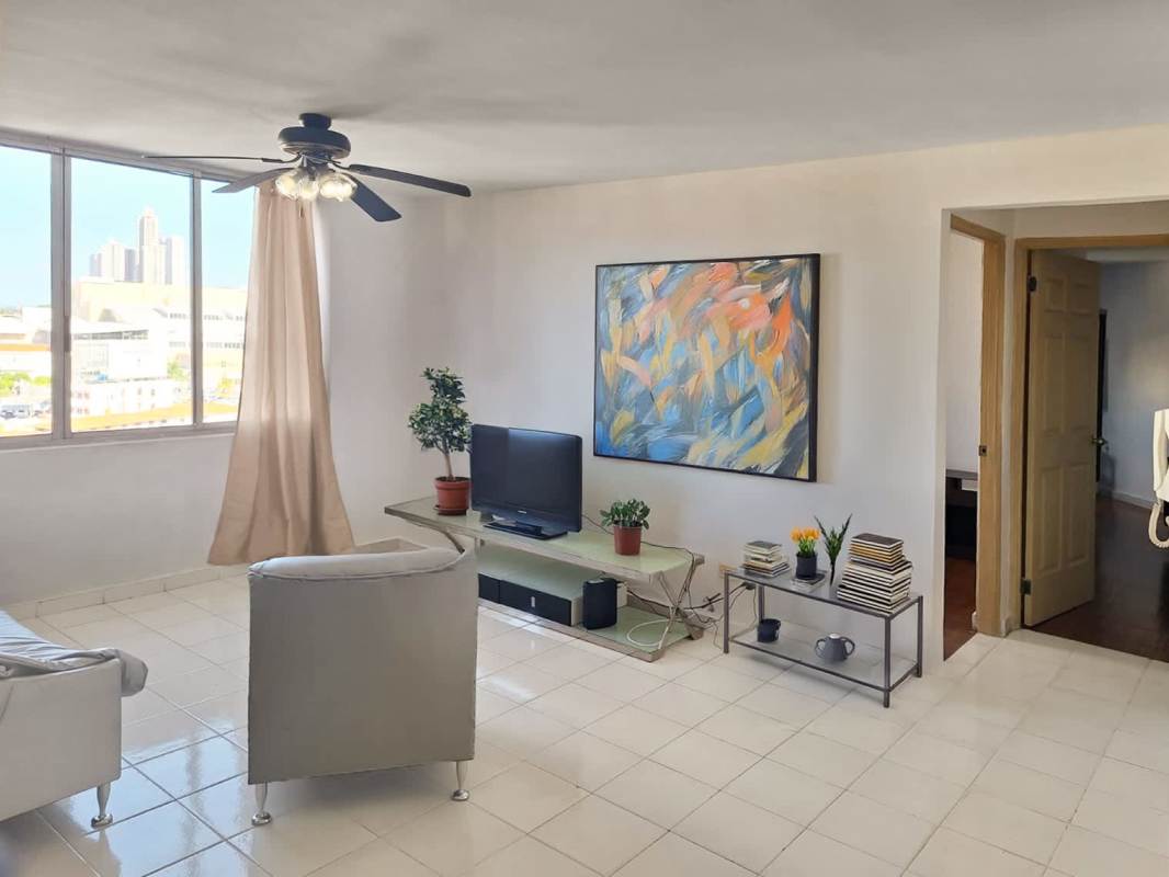 Kitchen with granite countertops, wood cabinets and appliances PH Excelsior Plaza Panama