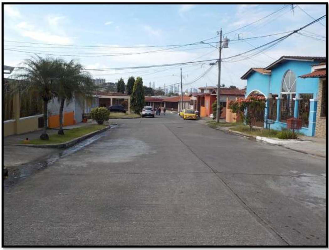 Open plan living dining room with tiled floors and bright window in Altos de La Castellana Panama