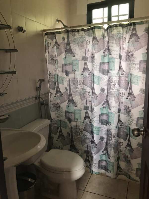 Bedroom with built-in closet and large window in family house for sale Brisas del Golf Panama