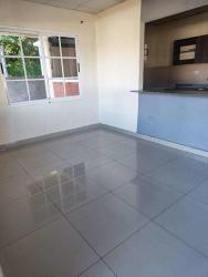 Full bathroom with tile finishes inside house Residencial Reserva de Azuero Panama