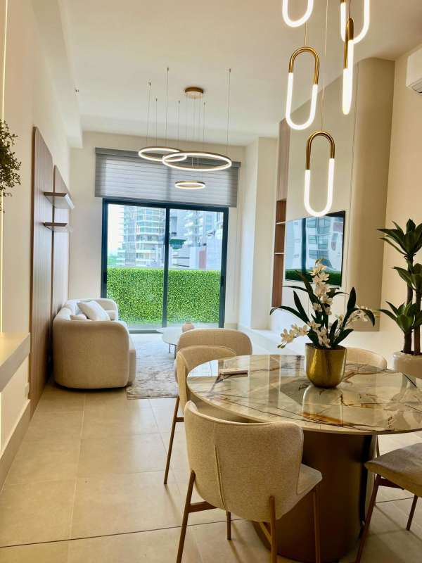 Fitness center with panoramic windows overlooking golf course in Ocean House Santa Maria Panama