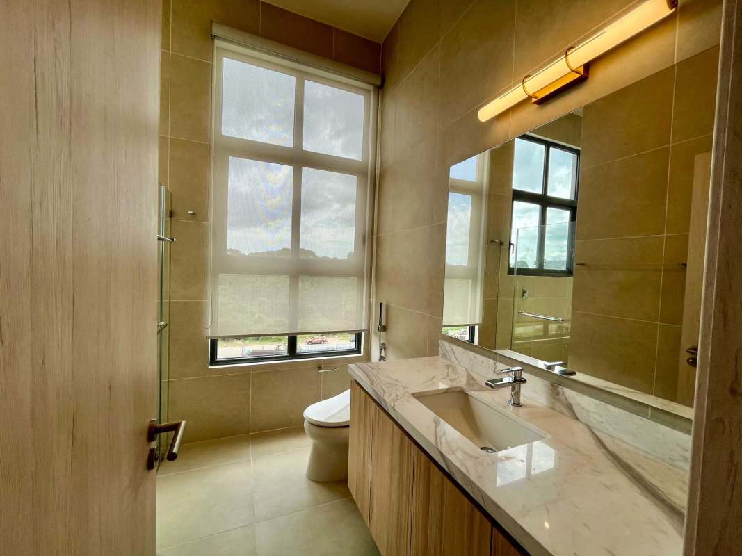 Modern bedroom with wood accent wall and large window Ocean House Santa Maria Panama City