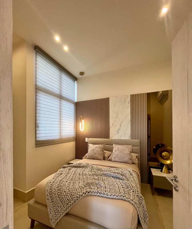 Bright luxurious bedroom with floor to ceiling windows and elegant finishes at Ocean House Santa Maria Panama City