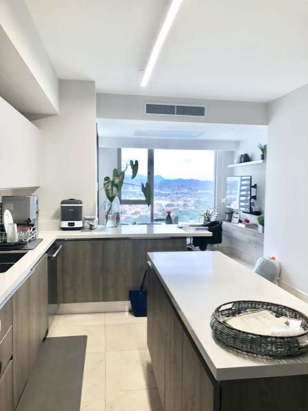 Modern den or TV lounge space with elegant finishes in Santa Maria Panama apartment