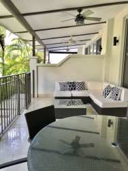 Terrace balcony with lounge and dining set in Puntarenas Buenaventura condo