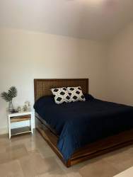 Loft bedroom with minimalist decor tile floor AC at Puntarenas Buenaventura