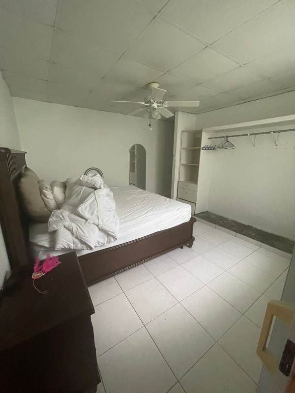 Spacious living dining area with ceiling fans porcelain tiles Panama house