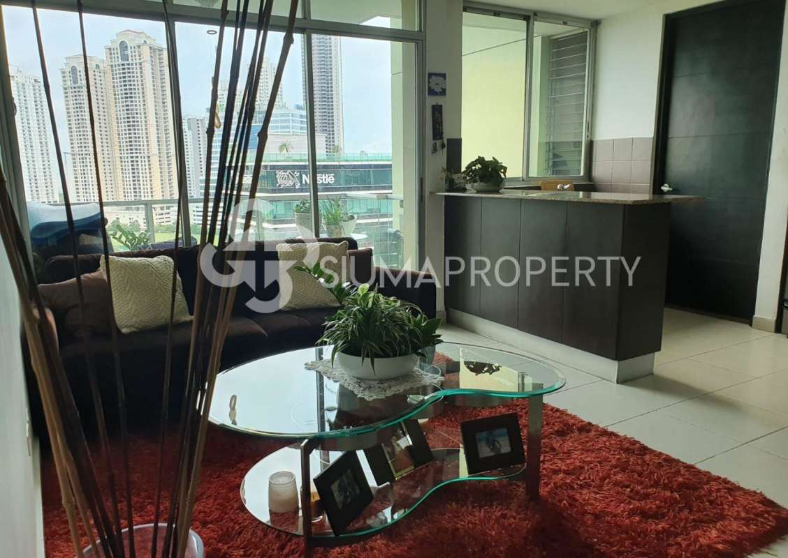 Modern open plan living dining area with balcony over city skyline Costa View Tower