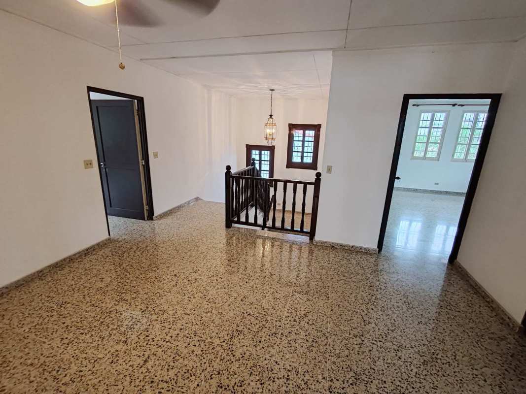 Elegant marble-floor entrance hallway with staircase villa Altos del Golf Panama