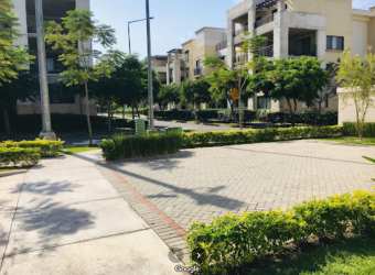 Paved walkways and gardens between apartment buildings PH River Valley Panama