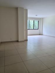 Bright living room with large window tiled flooring in PH River Valley Panama Pacifico
