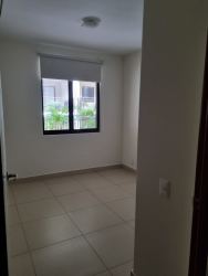 Apartment buildings with landscaped greenery and paved walkways PH River Valley Panama Pacifico