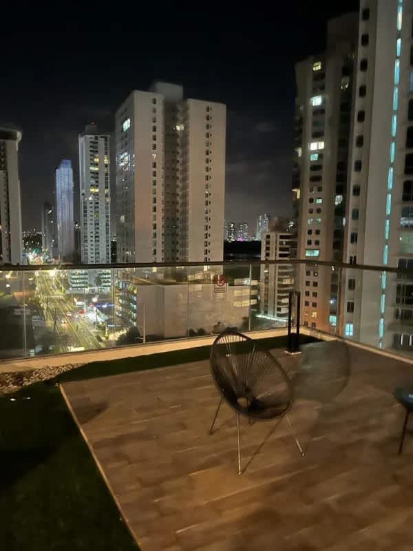 Balcony at night with panoramic Panama City skyline view PH Coco del Mar for rent