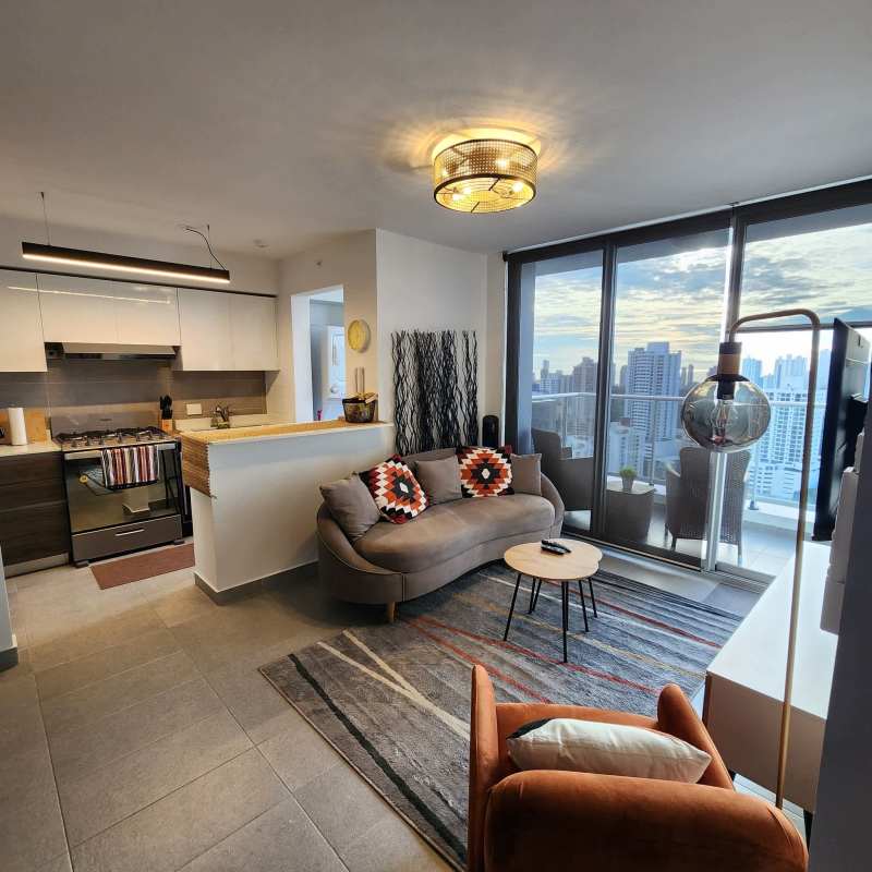 Furnished master bedroom with large window city views PH Park Square Panama City