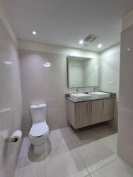 Modern bathroom double sink glass shower porcelain tile PH Mosaic Panama Pacifico rental