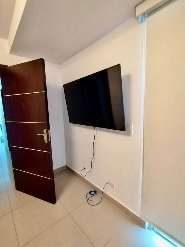 Spacious bright living-dining room with modern furniture in PH Top Tower Costa del Este Panama