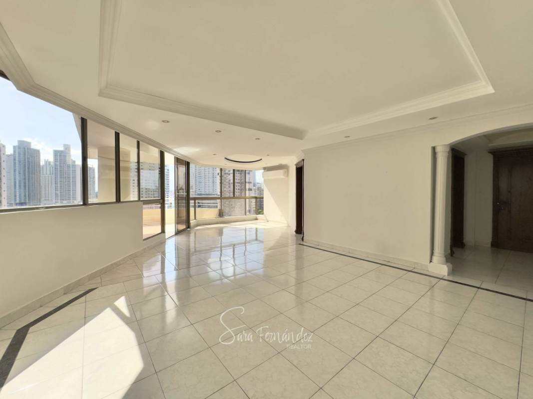 Contemporary kitchen with granite countertops, large windows, and utility area PH Avenida Balboa Panama City