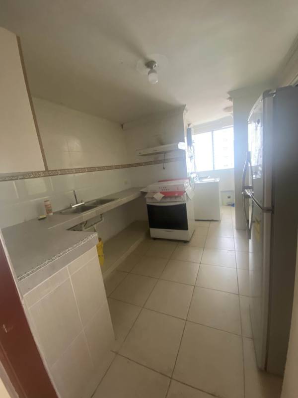 Spacious living dining area with city view and balcony access in PH Villa de las Fuentes Panama City