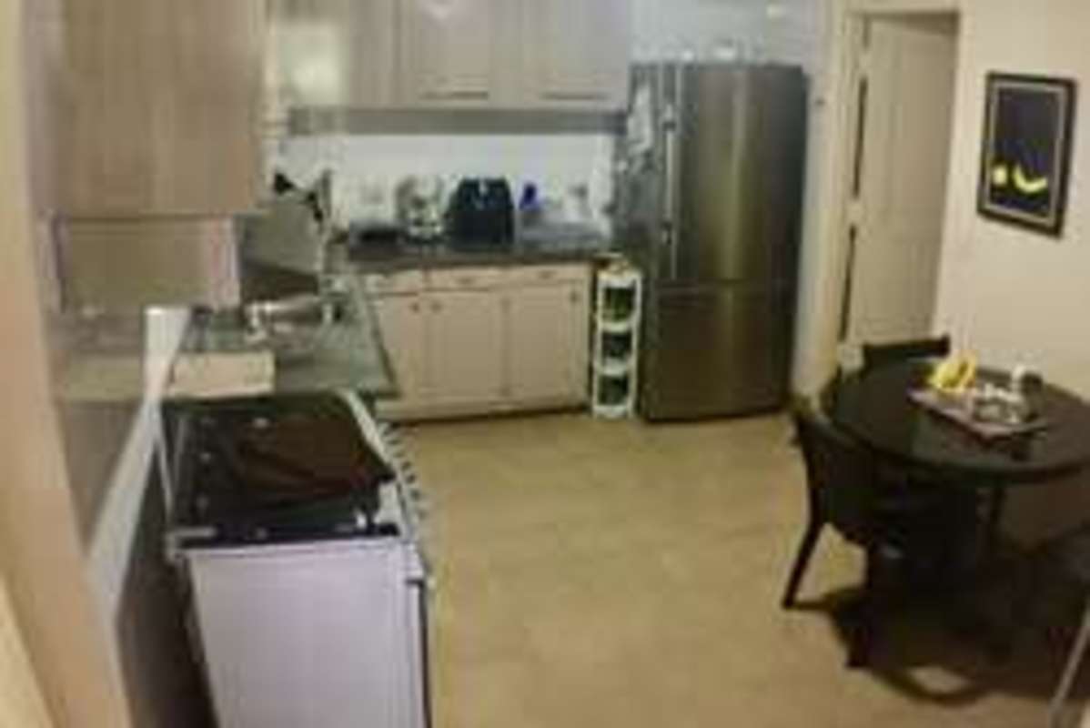 Traditional kitchen with dining area Diablo Heights Panama home sale