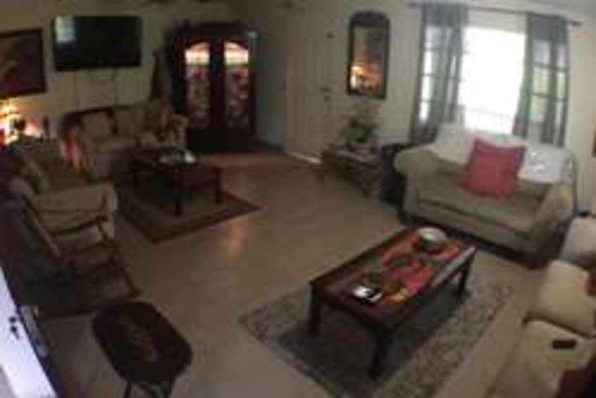 Family room with beige sofas, TV unit, and window Diablo Heights Panama