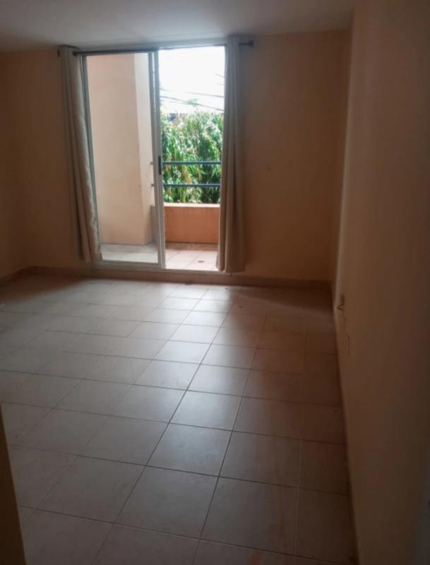 Kitchen with granite countertops, upper cabinets and appliances PH Terrazas de San Francisco Panama