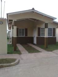Bedroom with black built-in closet, white walls tile floors rental Brisas de Belén