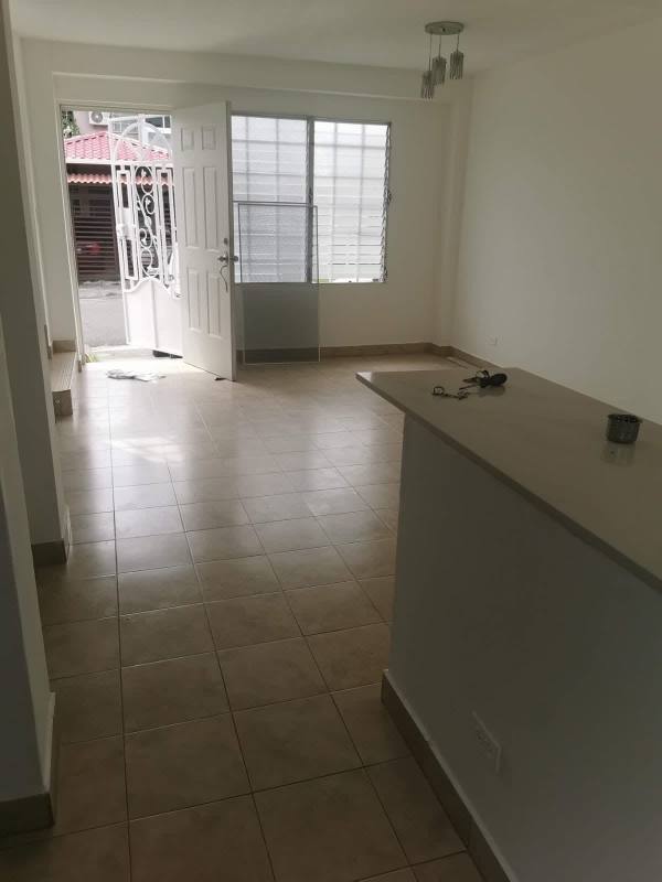 Kitchen with wooden cabinets, gas cooktop, tile backsplash Brisas del Lago Tocumen Panama