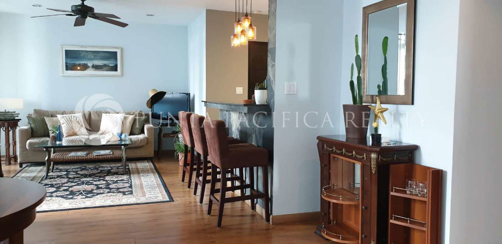 Dining space with breakfast bar integrated kitchen, city views at PH Bayfront Panama